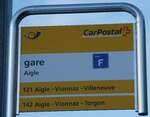 (231'269) - PostAuto-Haltestellenschild - Aigle, gare - am 14.